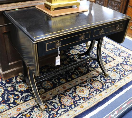 A Regency style ebonised and parcel gilt sofa table, W.95cm